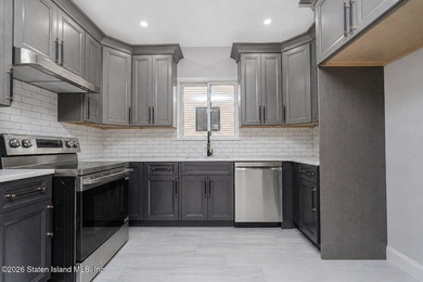 Welcome to this brand-new construction 7-over-7 two-family home - photo 8