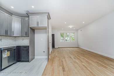 Welcome to this brand-new construction 7-over-7 two-family home - photo 10