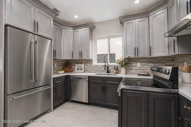Welcome to this brand-new construction 7-over-7 two-family home - photo 3