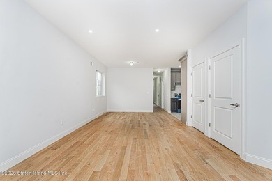 Welcome to this brand-new construction 7-over-7 two-family home - photo 5