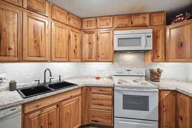 This unit offers everything you'd want in condo living - a top