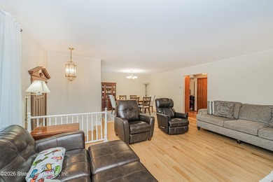 Welcome to 180 Kissel Ave, a beautifully expanded 3-bedroom cape - photo 5