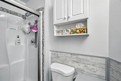 This unit offers everything you'd want in condo living - a top