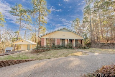 This comfortable home is nestled back in the pine trees on a - photo 2