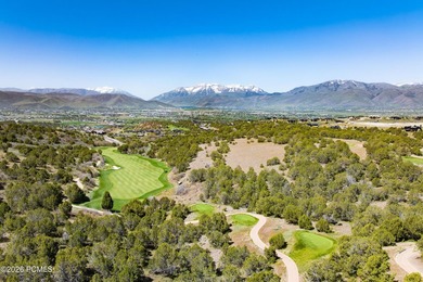 Perched at the very top of Red Ledges, this exceptional homesite - photo 3