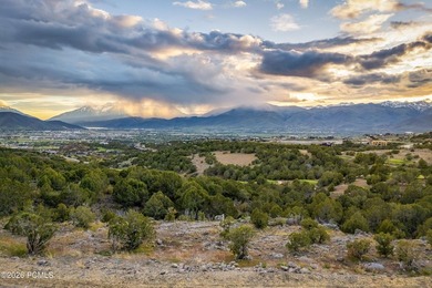 Perched at the very top of Red Ledges, this exceptional homesite - photo 10