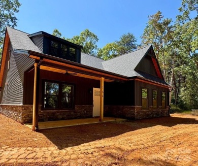 Welcome to your private retreat at 164 Suwanne Road, nestled - Lake Home Under Contract in Troy, North Carolina