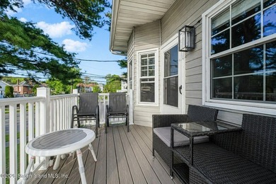 Experience modern living at its finest in this fully renovated - photo 3