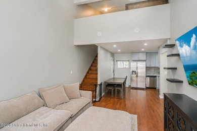 Experience modern living at its finest in this fully renovated - photo 4