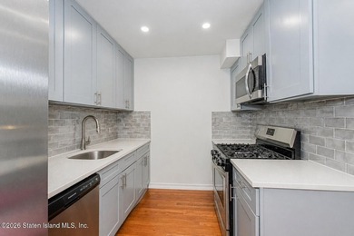 Experience modern living at its finest in this fully renovated - photo 7