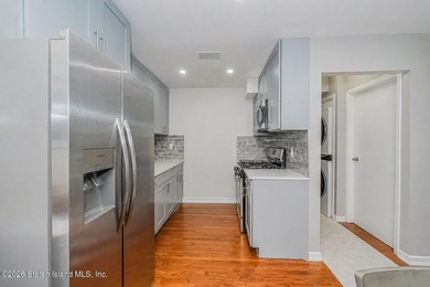 Experience modern living at its finest in this fully renovated - photo 8
