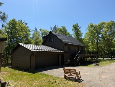 Nestled among mature trees on over an acre of peaceful land - photo 3