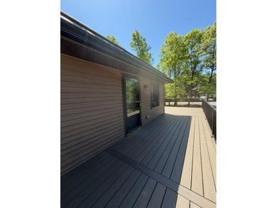 Nestled among mature trees on over an acre of peaceful land - photo 6
