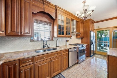 Welcome to this beautiful detached one-family home in the highly - photo 9