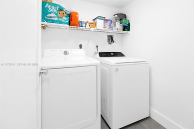 Beautifully updated unit featuring modern finishes throughout