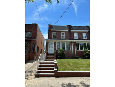Located in the heart of tree-lined Dyker Heights this home is - photo 1