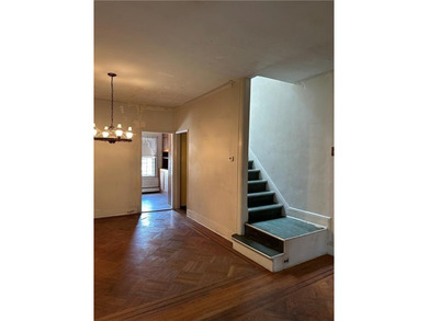 Located in the heart of tree-lined Dyker Heights this home is - photo 5