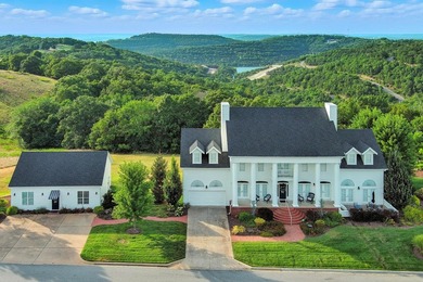 Emerald escape! This landmark home in the gated community of - photo 1