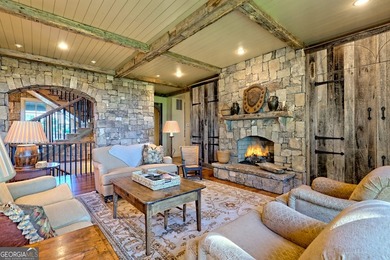 Perched high above the shimmering waters of Lake Burton within - photo 12