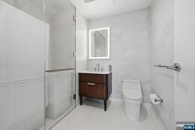 Experience luxury living at One Park in Cliffside Park, a 5-star - photo 17