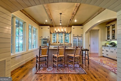 Perched high above the shimmering waters of Lake Burton within - photo 17