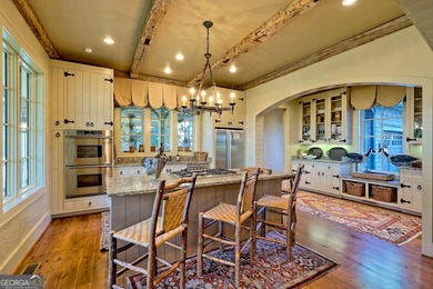 Perched high above the shimmering waters of Lake Burton within - photo 18
