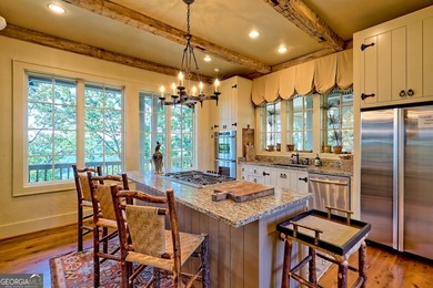 Perched high above the shimmering waters of Lake Burton within - photo 21