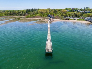 Set along the shores of Barnstable Harbor at the end of a - photo 3