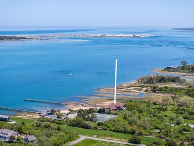 Set along the shores of Barnstable Harbor at the end of a - photo 10