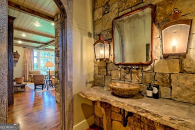 Perched high above the shimmering waters of Lake Burton within - photo 40