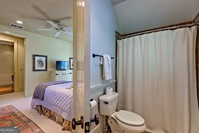 Perched high above the shimmering waters of Lake Burton within - photo 50