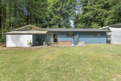 Tucked beneath towering redwoods on a full acre, this 2-bedroom - photo 33