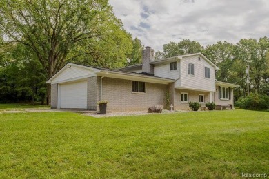 (private lake, pond, creek) Home For Sale in Oxford Michigan