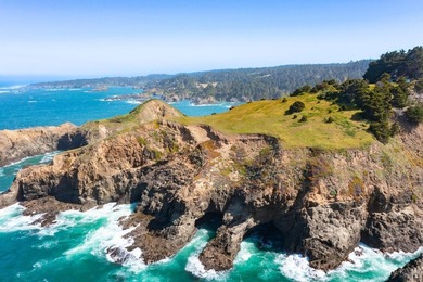 Unmatched views surround 3 sides of this rare oceanfront parcel - photo 2