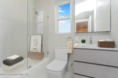 6 OVER 6 NEW CONSTRUCTION. BASEMENT SEPARATE ENTRANCE AND - photo 8