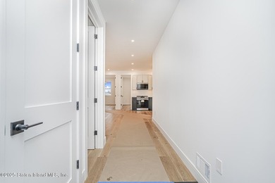6 OVER 6 NEW CONSTRUCTION. BASEMENT SEPARATE ENTRANCE AND - photo 10