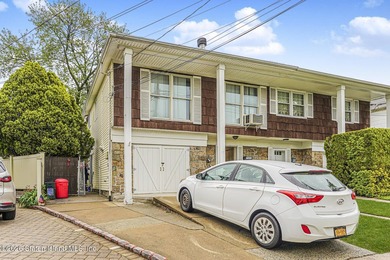 Welcome to 73 Gary Place! This large 2-family, semi-attached - photo 2