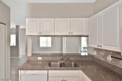 This move-in ready is 3-bedroom, 2-bath condo is located in the - photo 6