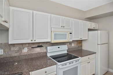 This move-in ready is 3-bedroom, 2-bath condo is located in the - photo 7