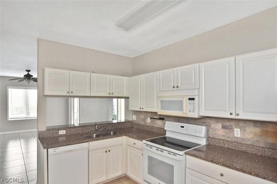 This move-in ready is 3-bedroom, 2-bath condo is located in the - photo 8