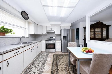 Rare-find semi-detached 2-family brick with a finished basement - photo 9