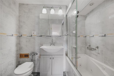 Discover this stunning renovated two-bedroom, two-full-bath coop - photo 8