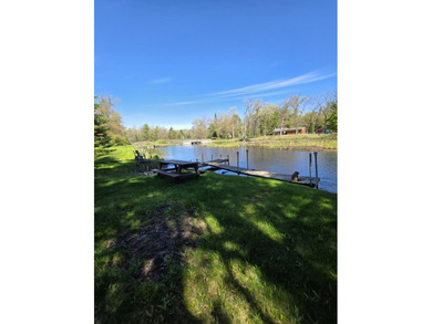 Escape to Northern Michigan with this inviting riverfront - photo 30