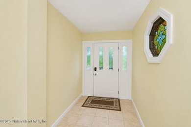 Welcome to 35 Nome Ave., an extra-large 2 family high ranch - photo 3