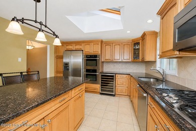 Welcome to 35 Nome Ave., an extra-large 2 family high ranch - photo 5