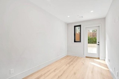 Brand New Lower-Level Duplex Condo with Backyard! SUPER LOW - photo 10