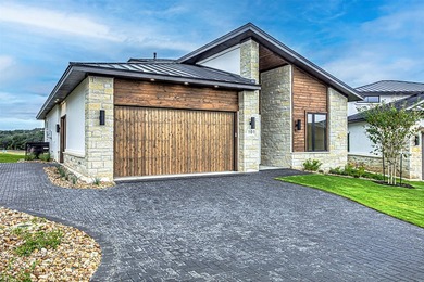 LOCK AND LEAVE CUSTOM HOME IN THE VILLA SECTION OF TUSCAN - photo 2