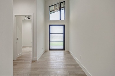 LOCK AND LEAVE CUSTOM HOME IN THE VILLA SECTION OF TUSCAN - photo 5