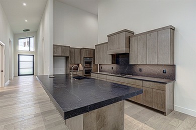 LOCK AND LEAVE CUSTOM HOME IN THE VILLA SECTION OF TUSCAN - photo 8