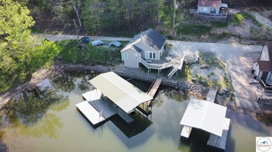 Experience true lakefront living in this 3-bedroom, 2-bath - photo 3